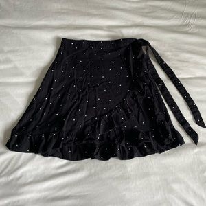 ARIZONA black polka dot mini wrap skirt